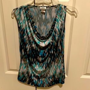 Green/gray/black/white sleeveless blouse. Size M